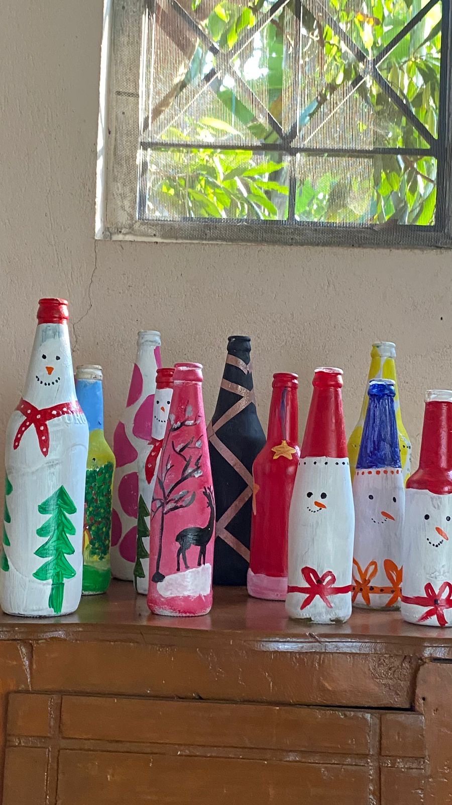 Christmas painted bottles display